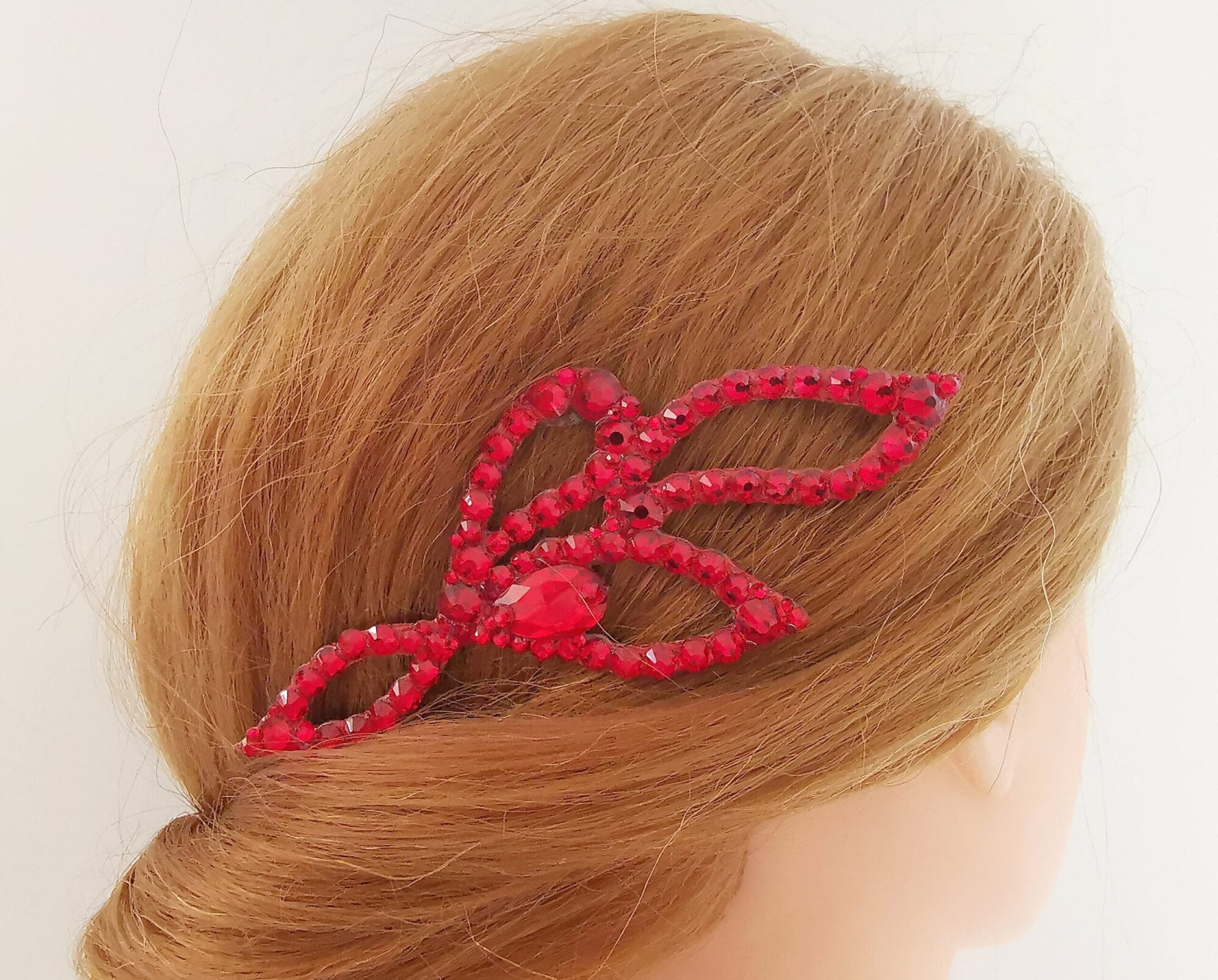 Ballroom hair piece with red crystals