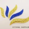 Ballroom hairpiece with yellow and blue rhinestones